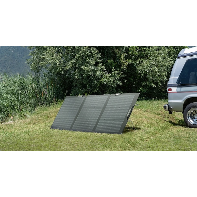 EcoFlow NextGen bifacial solar panel set up beside camper van for off-grid power