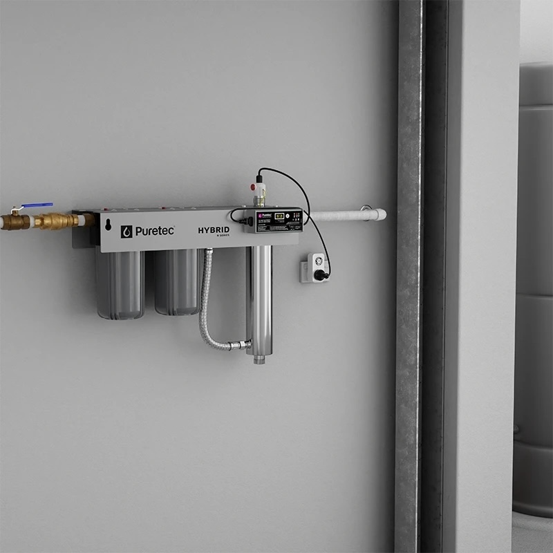 Puretec Hybrid R1 whole house rainwater filtration system installed on wall for tank water supply
