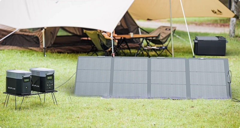 EcoFlow NextGen 220W portable solar panel powering EcoFlow power stations at a campsite, ideal for off-grid and outdoor use