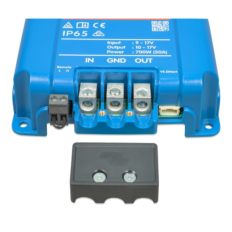 Victron Orion XS 12V to 12V 50A DC-DC battery charger showing heavy-duty input, ground and output terminals with protective cover removed.