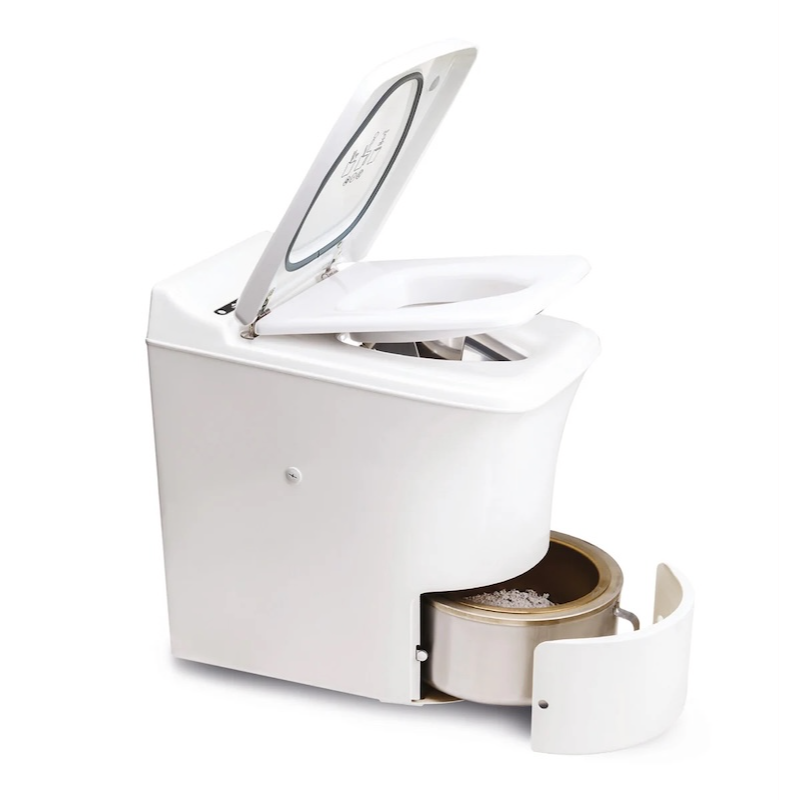 Cinderella incineration toilet showing ash container and waterless waste system