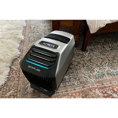 EcoFlow WAVE 2 portable air conditioner in use inside a small room, showing compact design and quiet operation.