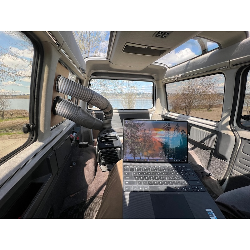 EcoFlow WAVE 2 with add-on battery cooling a campervan interior – ideal for off-grid van life and road trips.